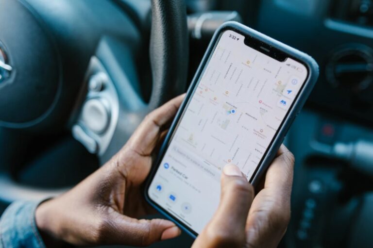A Person Checking the GPS on the Cellphone